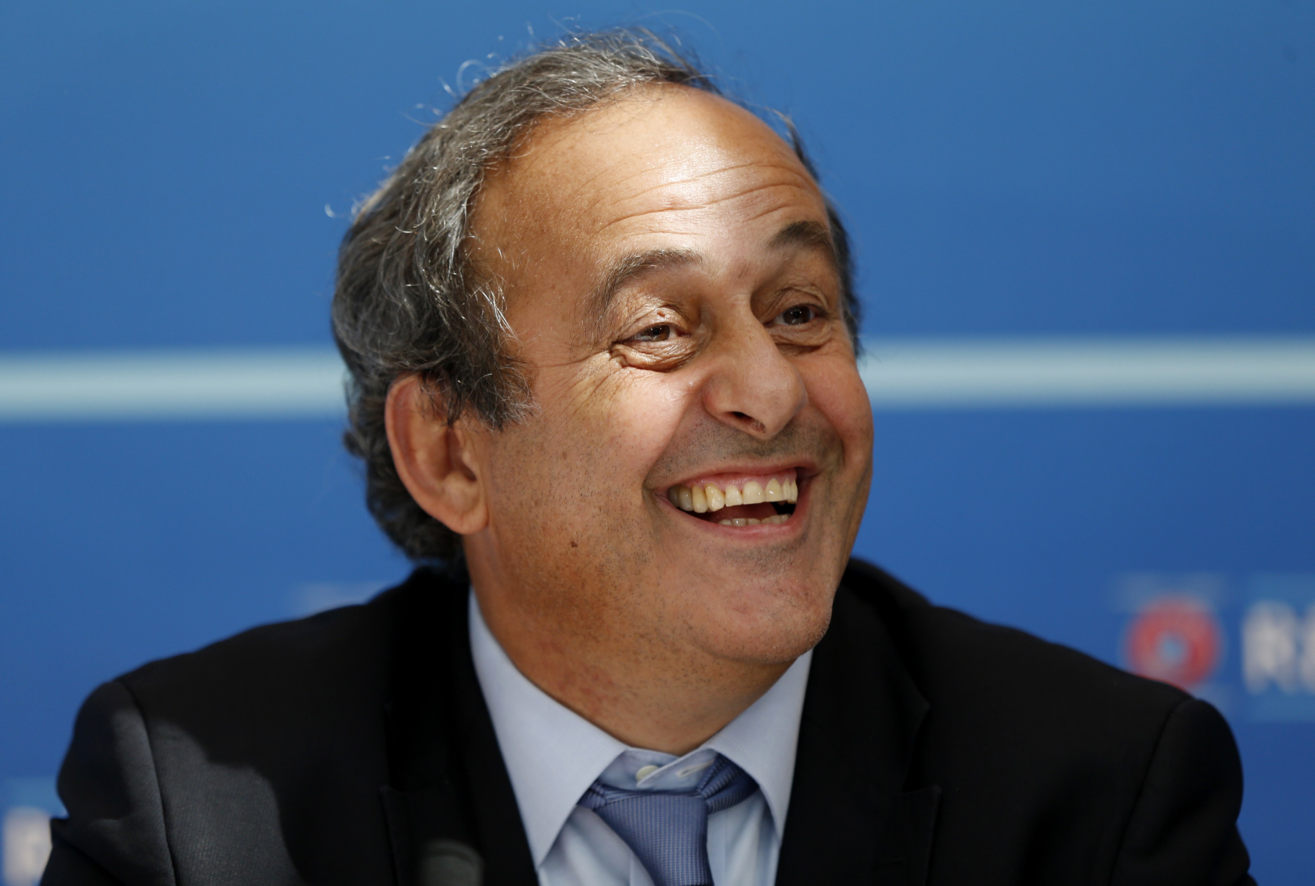 UEFA chief Michel Platini speaks during a UEFA press conference after the draw for the UEFA Europa League football group stage 2015/16 on August 28, 2015 in Monaco. AFP PHOTO / VALERY HACHE (Photo credit should read VALERY HACHE/AFP/Getty Images)