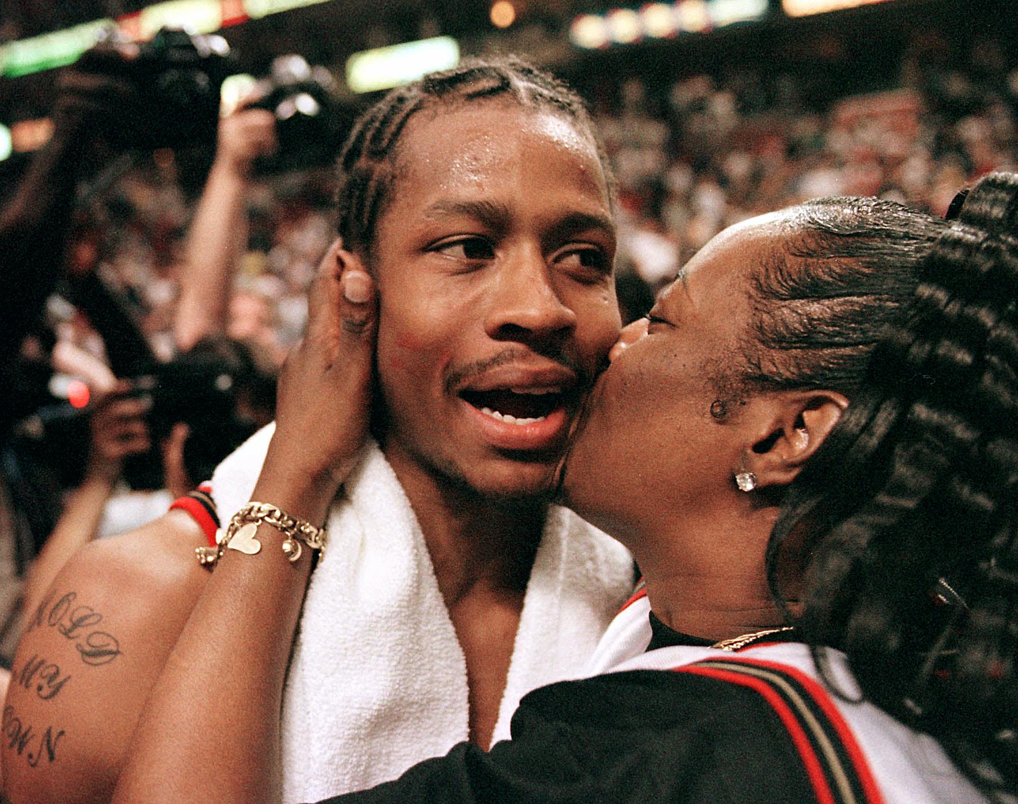 The Philadelphia 76ers' Allen Iverson gets a kiss