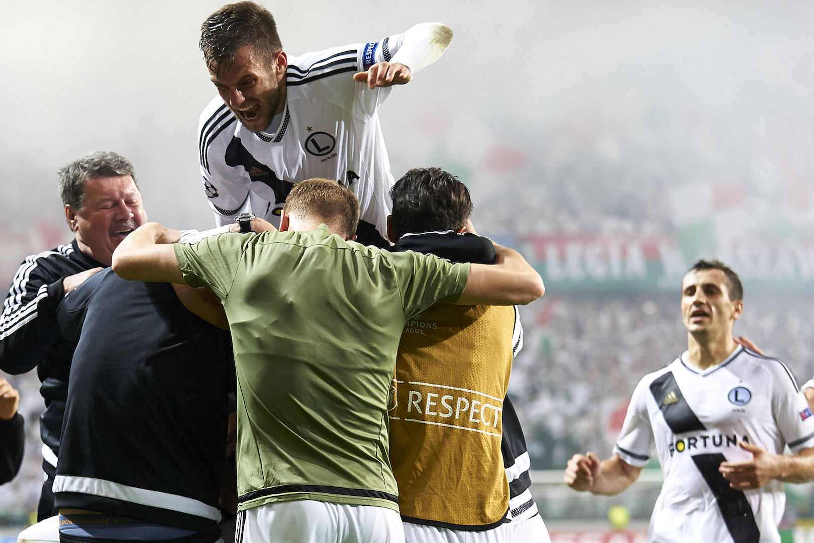 WARSAW, POLAND - AUGUST 23: Michal Kucharczyk of Legia Warsaw celebrates with team mates after scoring during Legia Warsaw v Dundalk FC - UEFA Champions League Play Off 2nd Leg at the Wojsko Polskie Stadium on August 23, 2016 in Warsaw, Poland. (Photo by Adam Nurkiewicz/Getty Images)