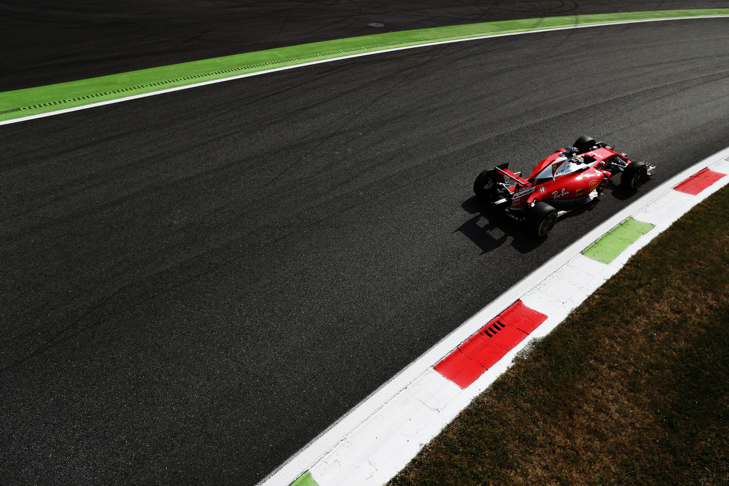 MONZA, ITALY - SEPTEMBER 02: Sebastian Vettel of Germany driving the (5) Scuderia Ferrari SF16-H Ferrari 059/5 turbo (Shell GP) on track during practice for the Formula One Grand Prix of Italy at Autodromo di Monza on September 2, 2016 in Monza, Italy. (Photo by Mark Thompson/Getty Images)