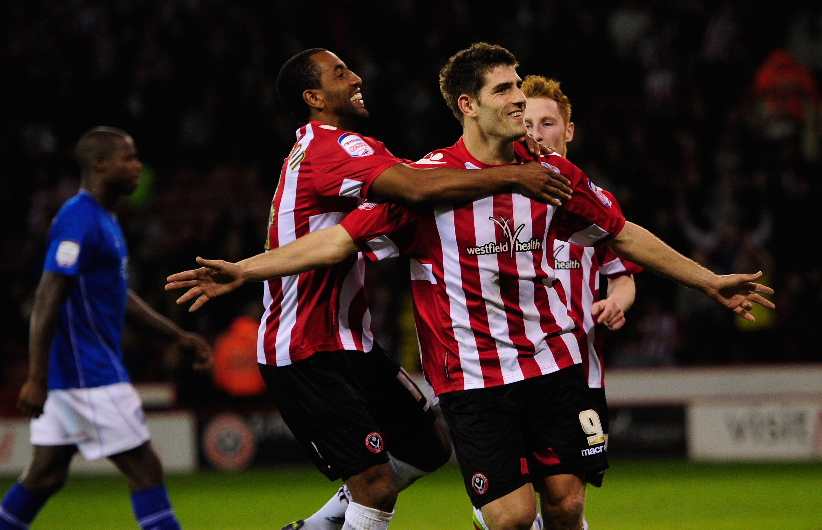 SHEFFIELD, ENGLAND - MARCH 28: Sheffield United player Ched Evans (c) celebrates after scoring his penalty during the npower League One game between Sheffield United and Chesterfield at Bramall Lane on March 28, 2012 in Sheffield, England. (Photo by Stu Forster/Getty Images)