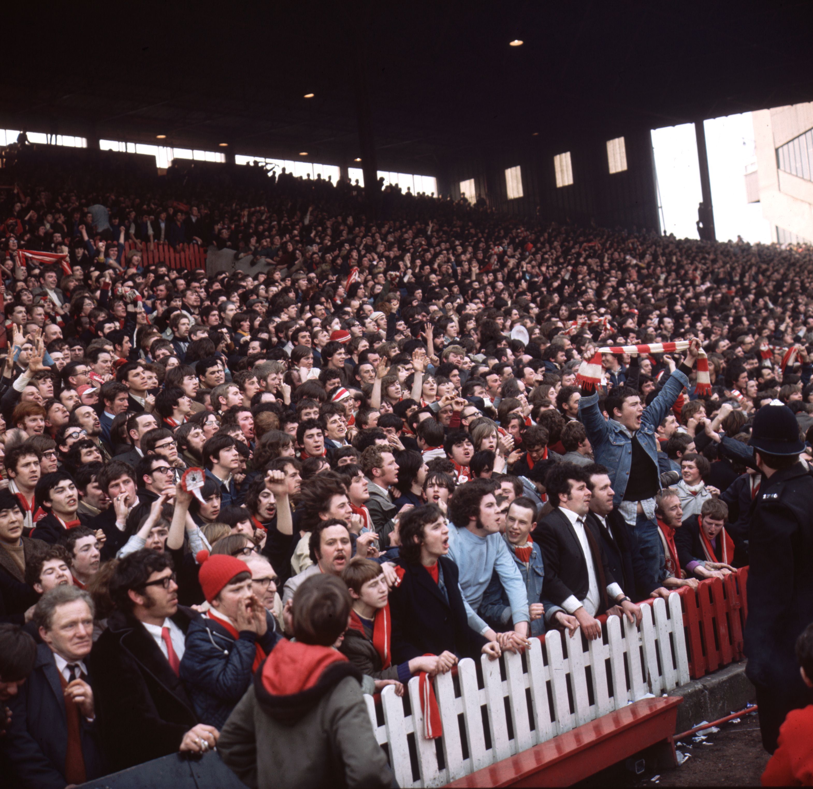 1971: Supporters of Liverpool FC on the terraces during a semi-final match against Everton in the FA cup. (Photo by Aubrey Hart/Express/Getty Images)