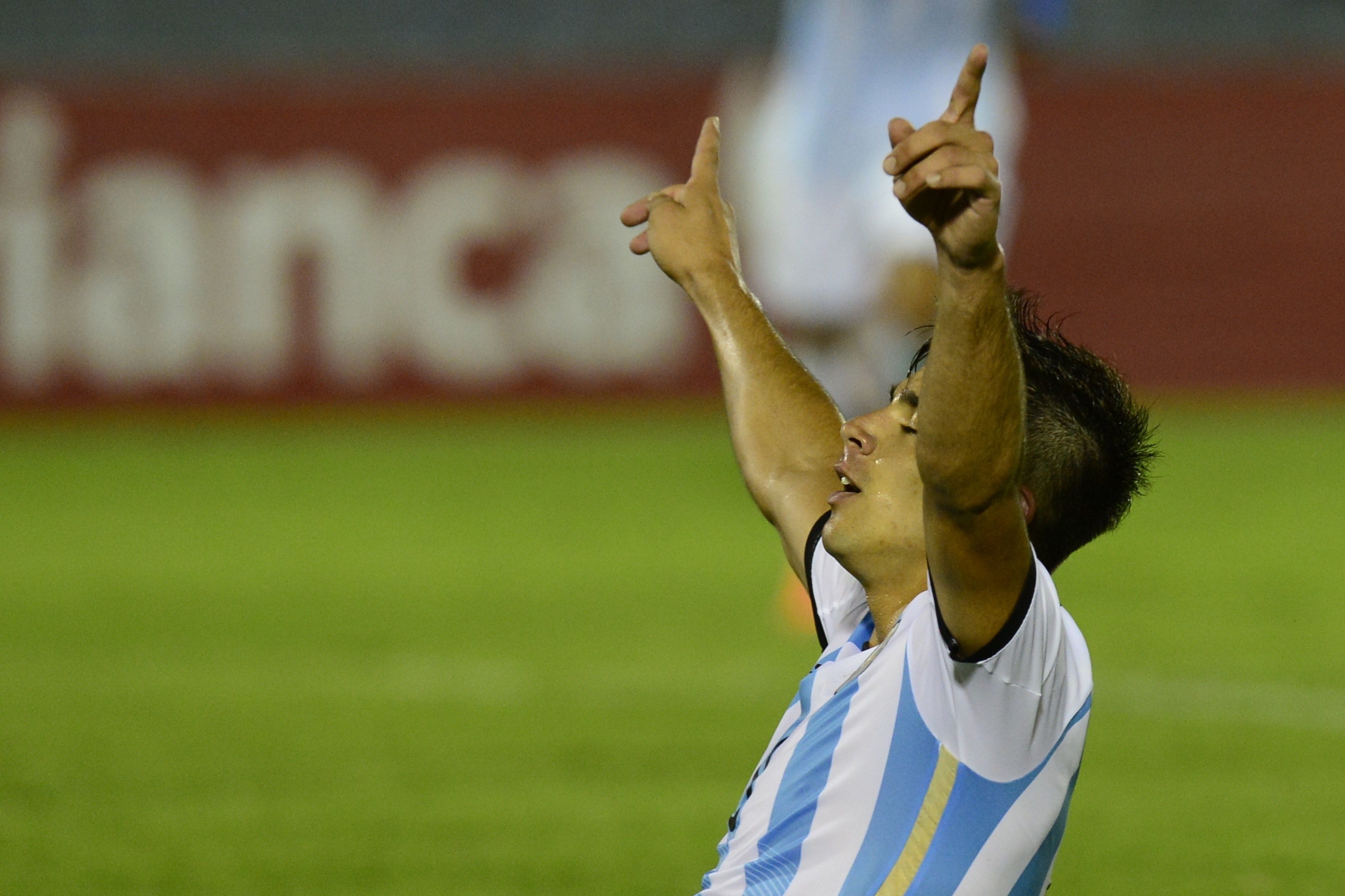 Argentina's forward Giovanni Simeone, celebrates his goal against Paraguay during their South American U-20 football match at the Centenario stadium in Montevideo on February 4, 2015. AFP PHOTO / PABLO PORCIUNCULA (Photo credit should read PABLO PORCIUNCULA/AFP/Getty Images)