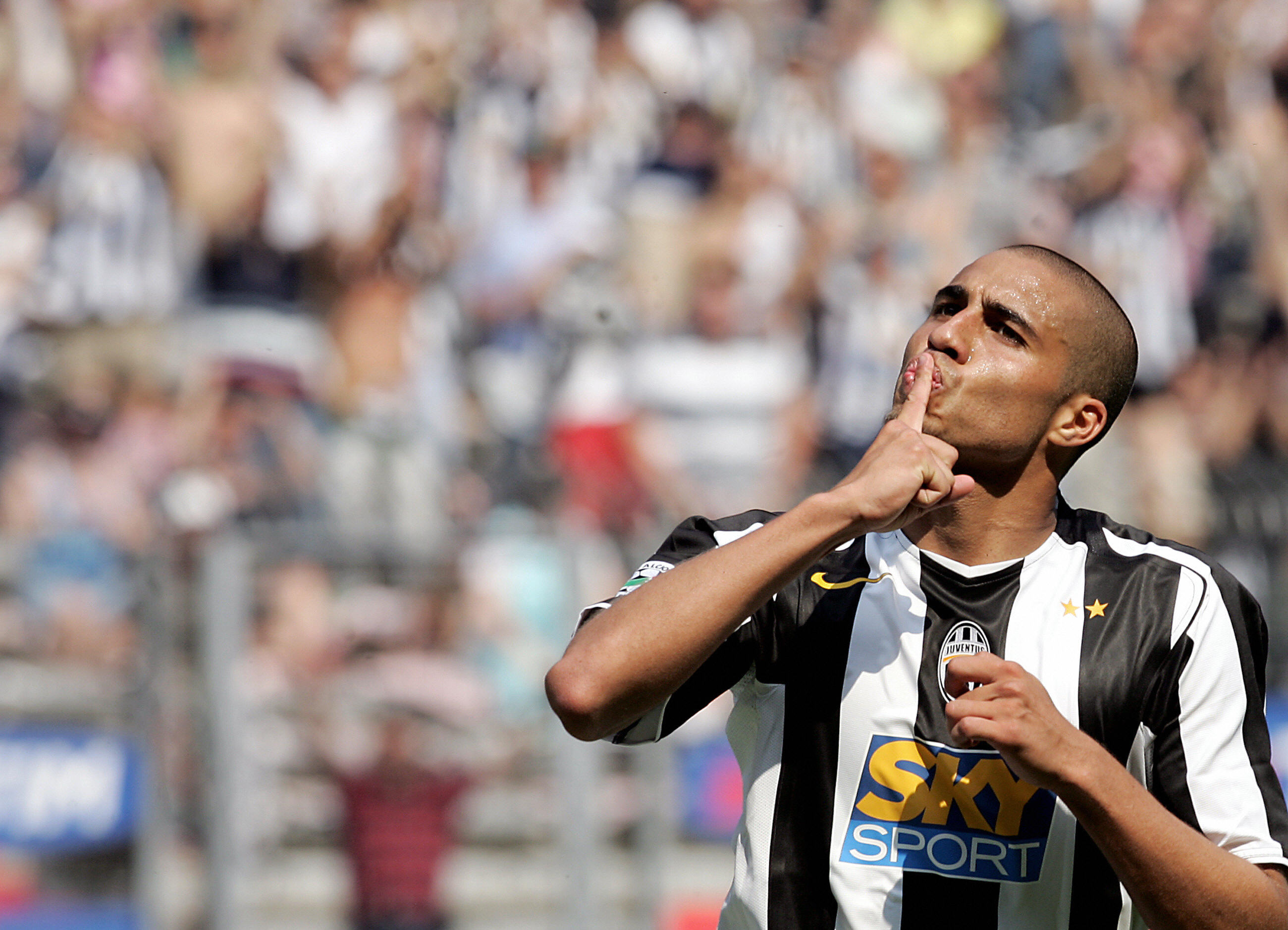 TURIN, ITALY: Juventus France international David Trezeguet jubilates after scoring a goal against Cagliari during the last Serie A football match of the season in Turin's Delle Alpi Stadium 29 May 2005. AFP PHOTO/ Filippo MONTEFORTE (Photo credit should read FILIPPO MONTEFORTE/AFP/Getty Images)