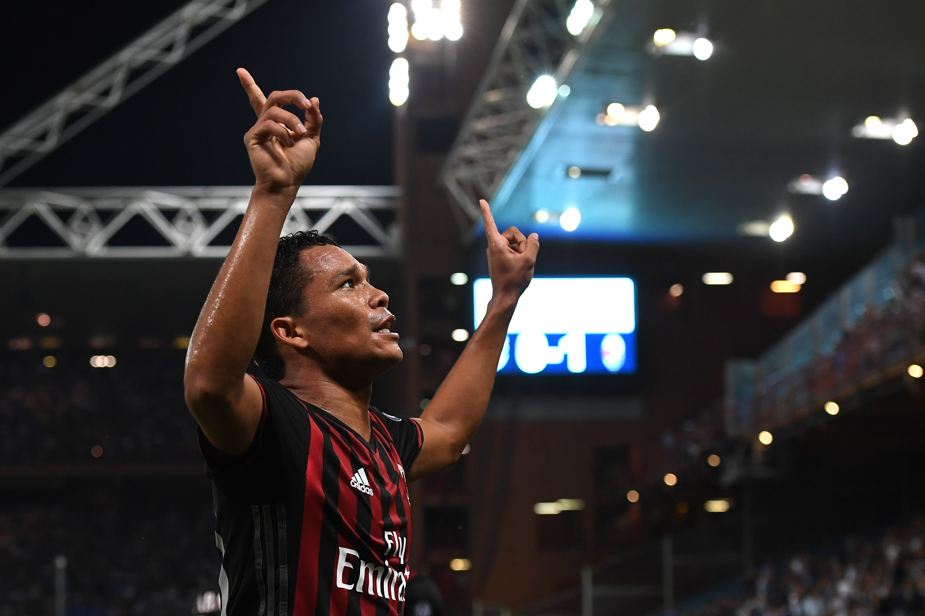 GENOA, ITALY - SEPTEMBER 16: Carlos Bacca of AC Milan celebrates after scoring the opening goal during the Serie A match between UC Sampdoria and AC Milan at Stadio Luigi Ferraris on September 16, 2016 in Genoa, Italy. (Photo by Valerio Pennicino/Getty Images)