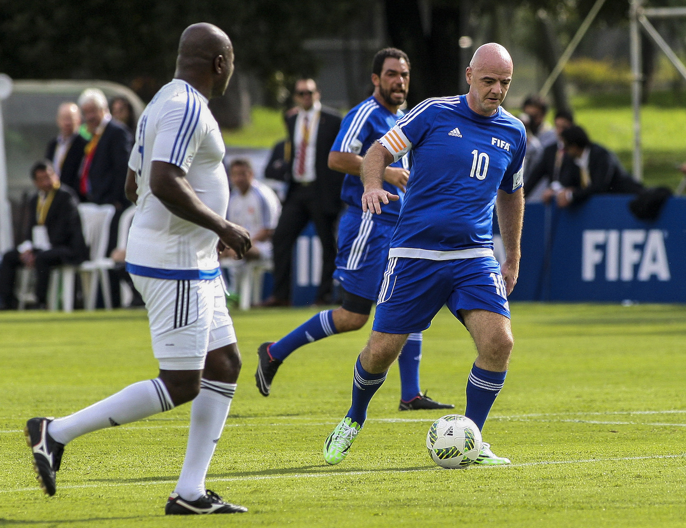 FIFA's President Gianni Infantino plays during a friendly football match with former Colombian players and international football stars in Bogota, on October 3, 2016. Infantino arrived in Colombia to attend the final of the Colombia 2016 FIFA Futsal World Cup on October 1. / AFP / STR (Photo credit should read STR/AFP/Getty Images)