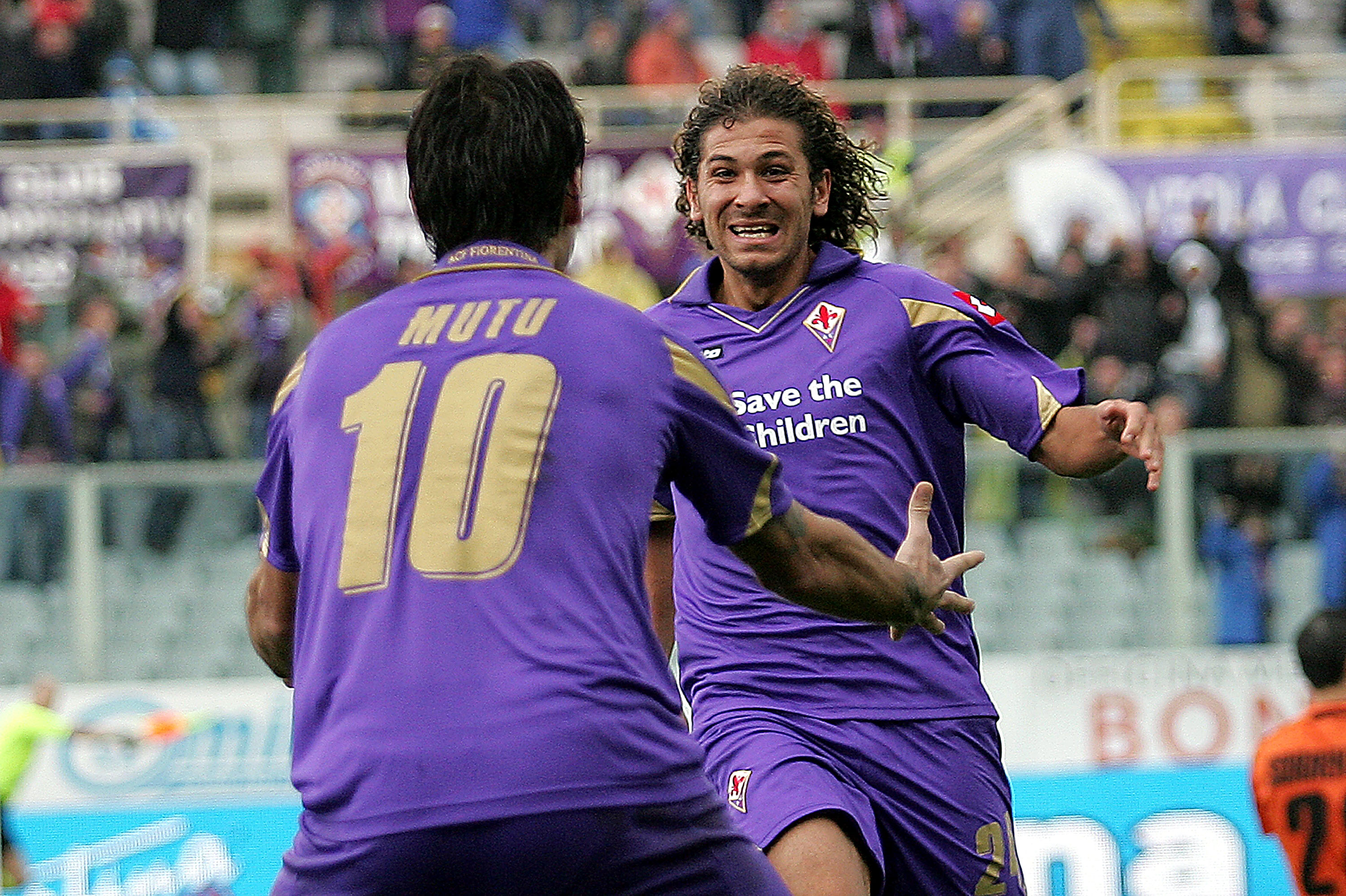 FLORENCE, ITALY - NOVEMBER 07: Alessio Cerci (R) and Adrioan Mutu (L) of ACF Fiorentina celebrate after scoring a goal during the Serie A match between Fiorentina and Chievo at Stadio Artemio Franchi on November 7, 2010 in Florence, Italy. (Photo by Gabriele Maltinti/Getty Images)