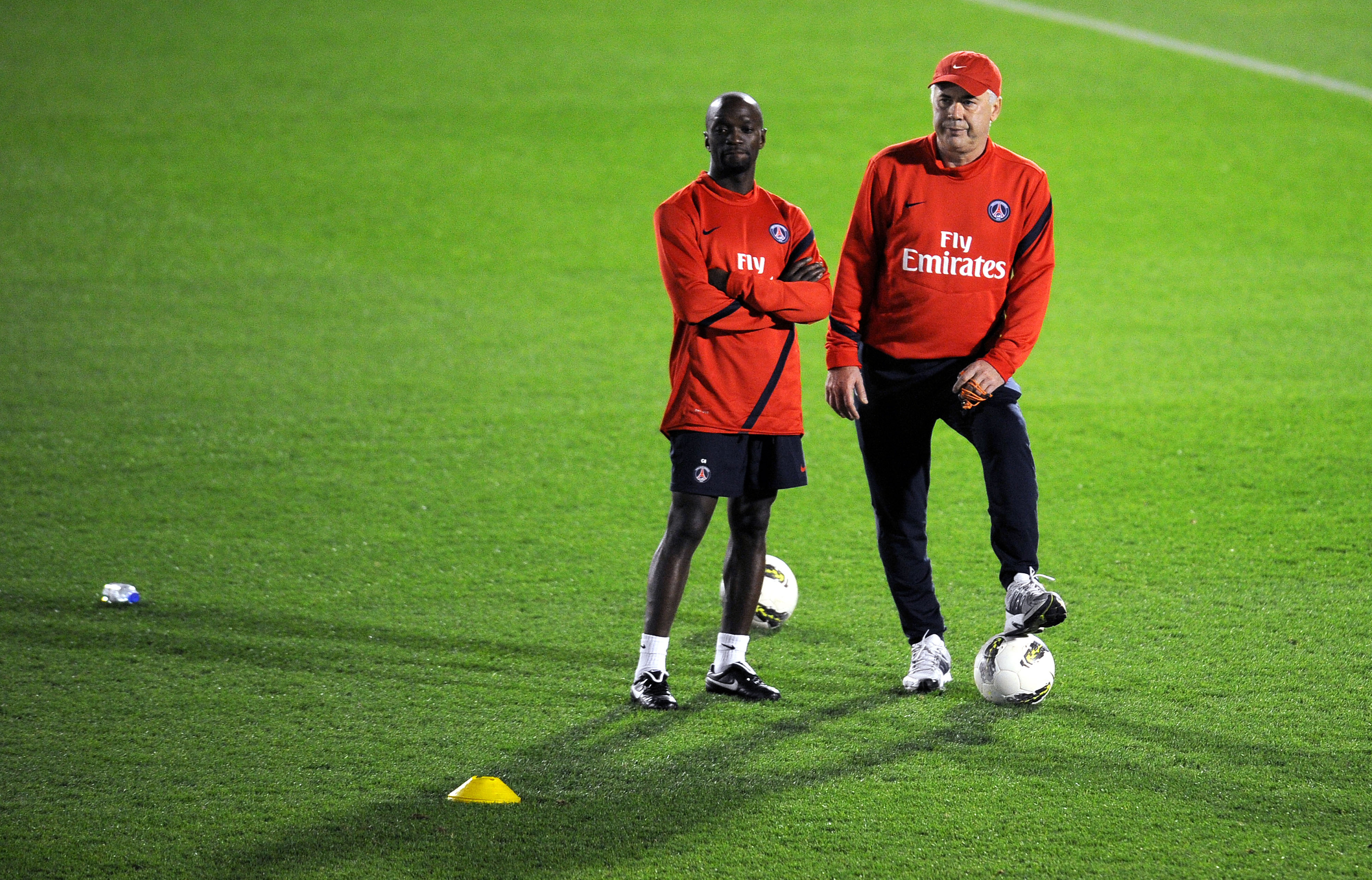 New coach of the Paris Saint-Germain football team Carlo Ancelotti (R) of Italy and new assistant coach Claude Makelele attend a training session at the Aspire complex in Doha on January 2, 2012. PSG will play a friendly football match against AC Milan on January 4 for the Dubai Football Challenege. AFP PHOTO/ FRANCK FIFE (Photo credit should read FRANCK FIFE/AFP/Getty Images)