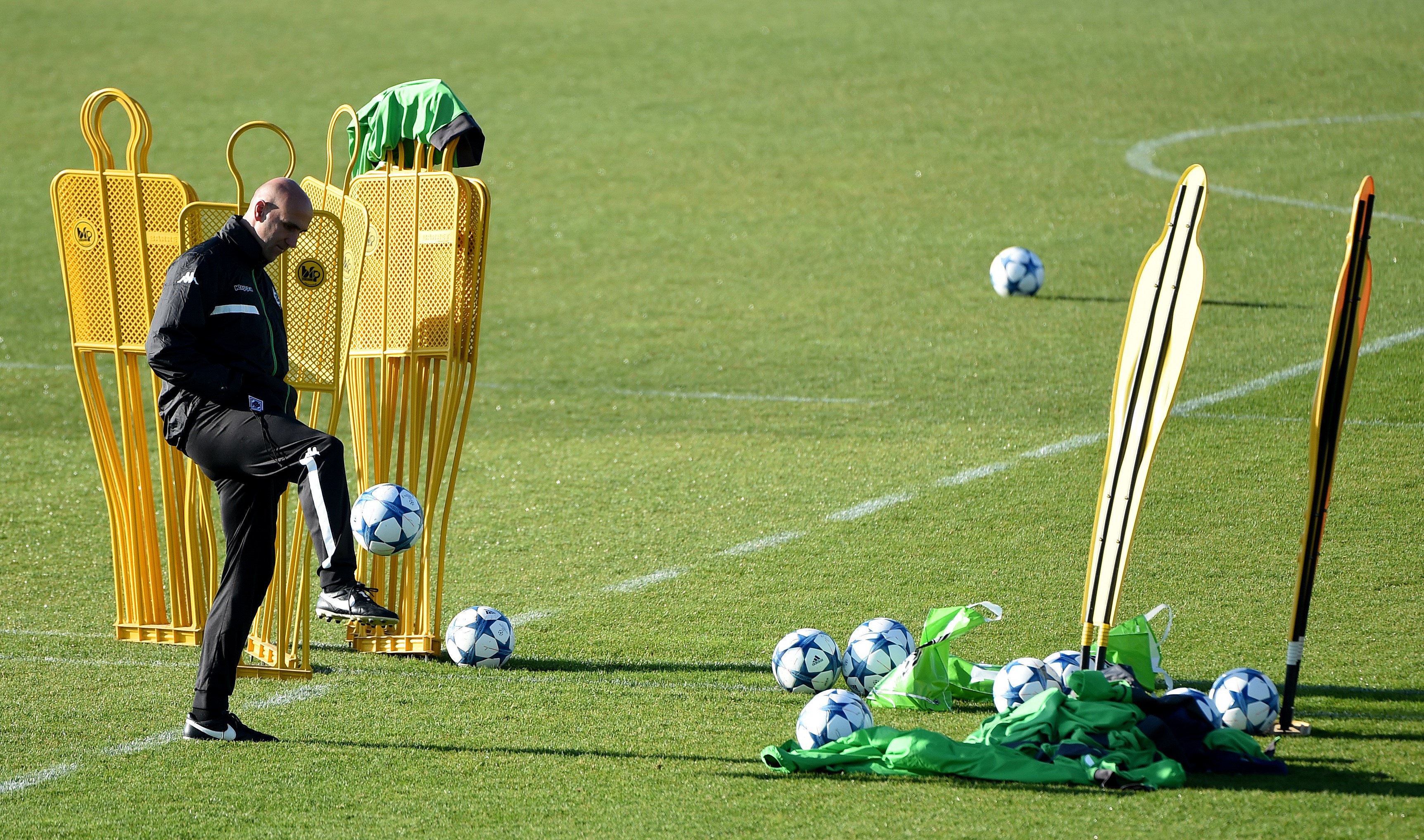 Moenchengladbach's head coach Andre Schubert plays the ball during a training session on the eve of the Group D, second-leg UEFA Champions League football match Borussia Moenchengladbach vs Juventus in Moenchengladbach, western Germany on November 2, 2015. AFP PHOTO / PATRIK STOLLARZ (Photo credit should read PATRIK STOLLARZ/AFP/Getty Images)