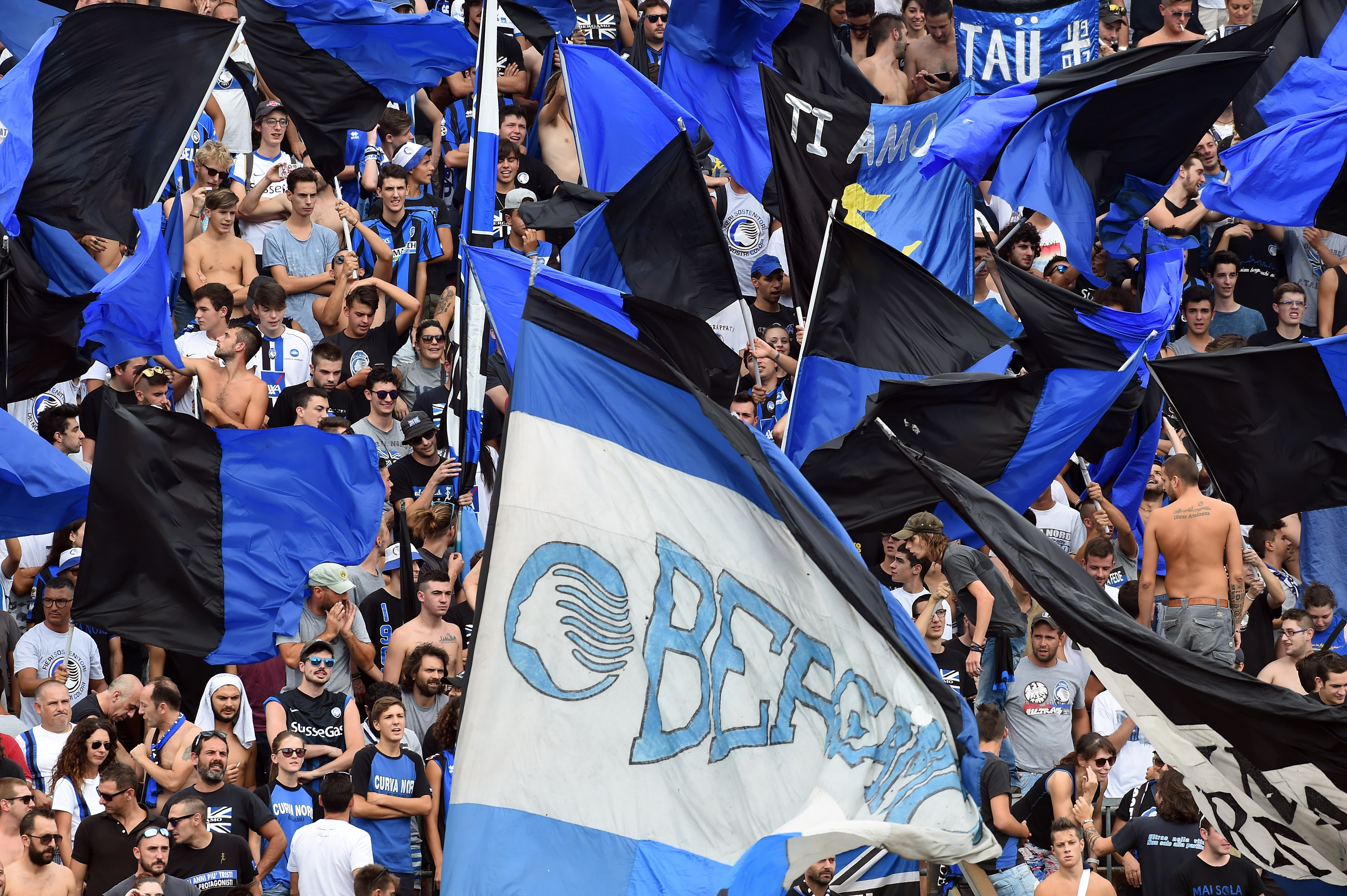 BERGAMO, ITALY - SEPTEMBER 11: Atalanta fans waving flags during the Serie a match between Atalanta BC and FC Torino at Stadio Atleti Azzurri d'Italia on September 11, 2016 in Bergamo, Italy. (Photo by Pier Marco Tacca/Getty Images)