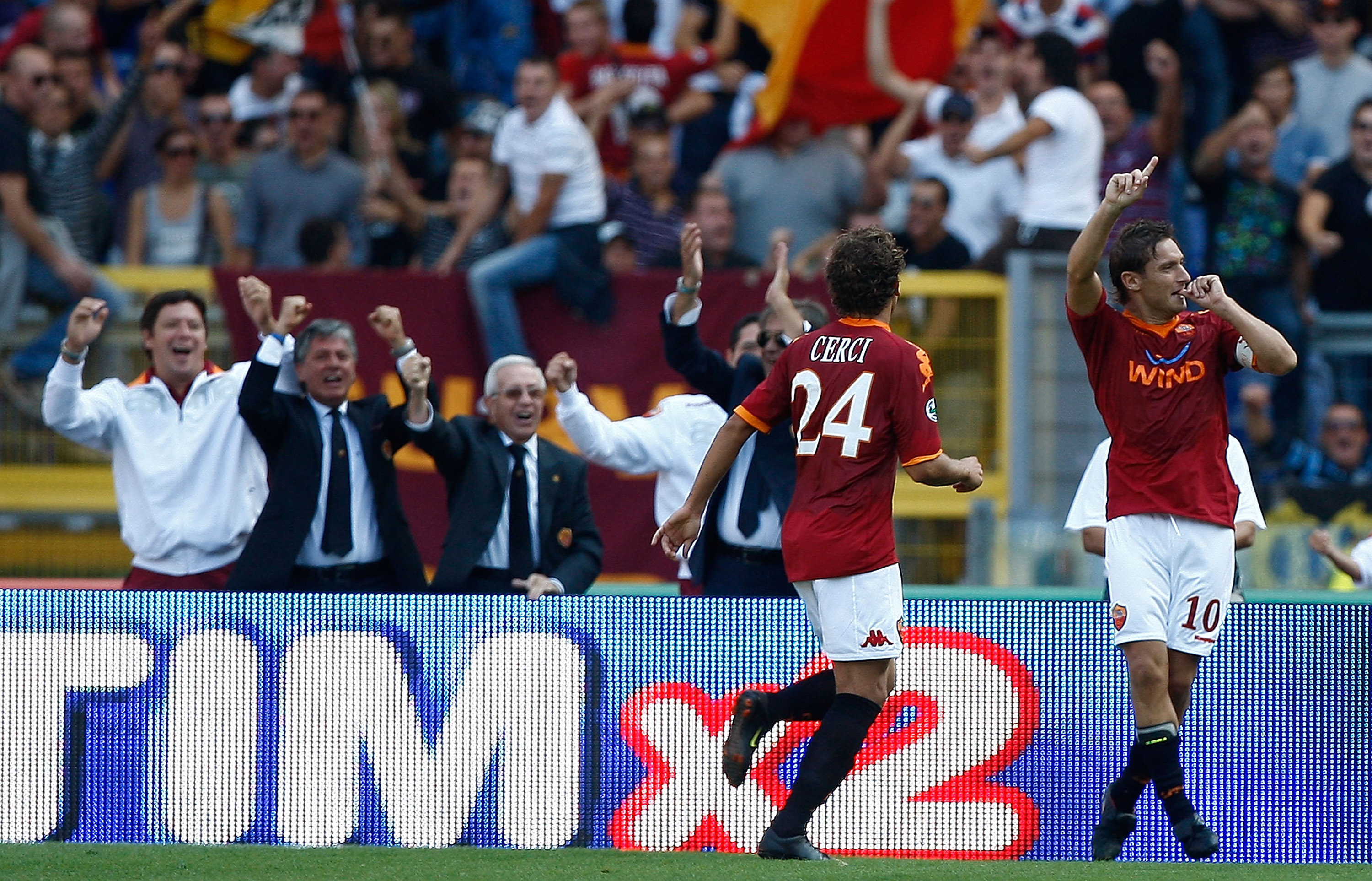 ROME - OCTOBER 04: Francesco Totti (R) and Alessio Cerci of AS Roma celebrates the opening goal during the Serie A match between AS Roma and SSC Napoli at Olimpico Stadium on October 4, 2009 in Rome, Italy. (Photo by Paolo Bruno/Getty Images)