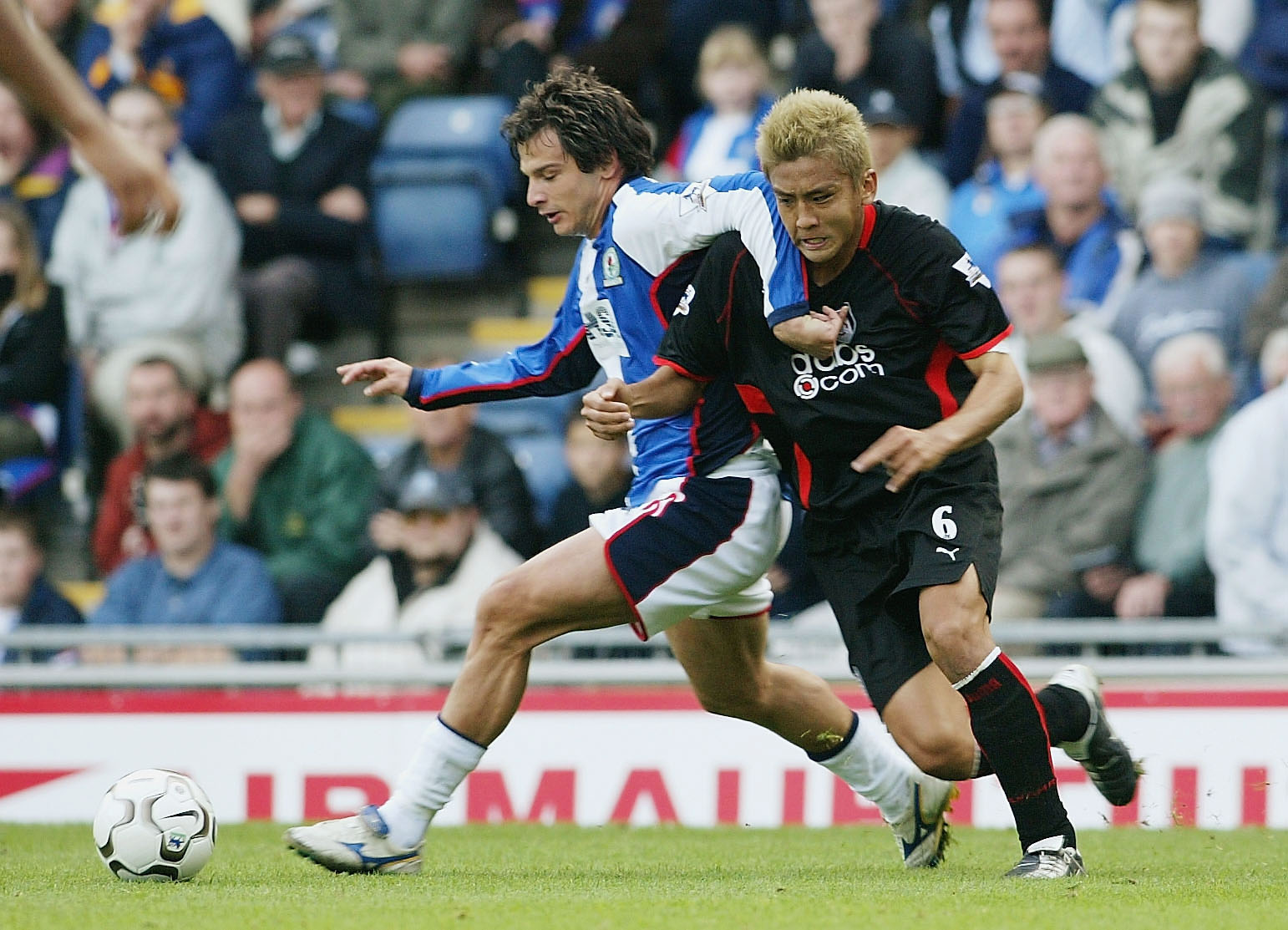 BLACKBURN, ENGLAND - SEPTEMBER 28: Junichi Inamoto of Fulham battles with Ciccio Grabbi of Blackburn during the FA Barclaycard Premiership match between Blackburn Rovers and Fulham at Ewood Park on September 28, 2003 in Blackburn, England. (Photo by Laurence Griffiths/Getty Images)