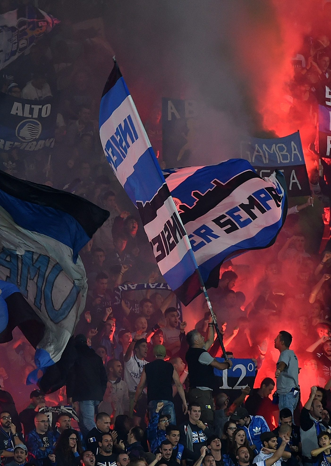 BERGAMO, ITALY - SEPTEMBER 21: Fans of Atalanta show their support during the Serie A match between Atalanta BC and US Citta di Palermo at Stadio Atleti Azzurri d'Italia on September 21, 2016 in Bergamo, Italy. (Photo by Tullio M. Puglia/Getty Images)