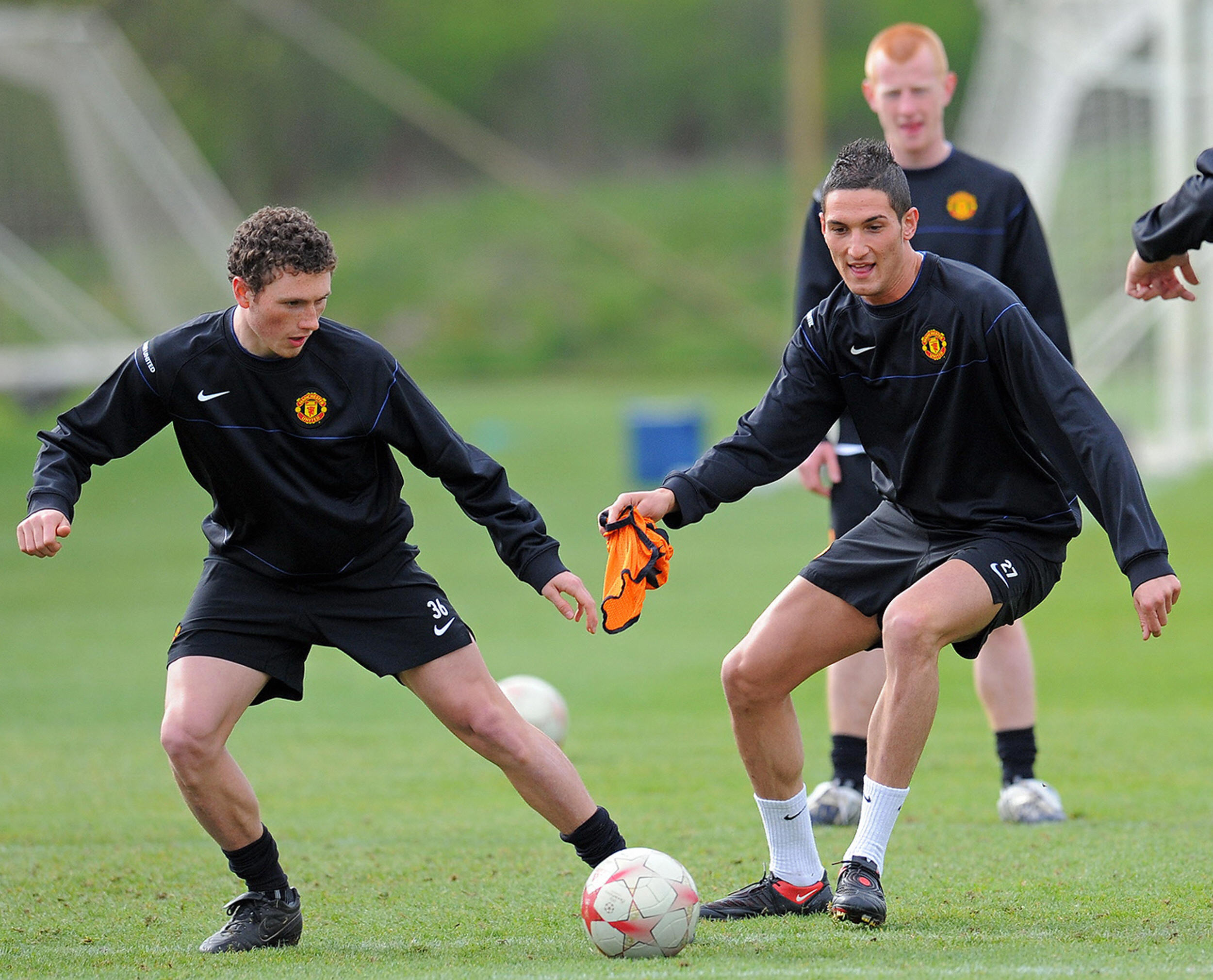 Manchester United's Italian footballer Federico Macheda (R) takes part in a training session at their Carrington training ground in Manchester, north- west England on April 6, 2009. Manchester United take on Porto in their UEFA Champions League quarter final fiest leg football match on April 7 at Old Trafford. AFP PHOTO/PAUL ELLIS (Photo credit should read PAUL ELLIS/AFP/Getty Images)