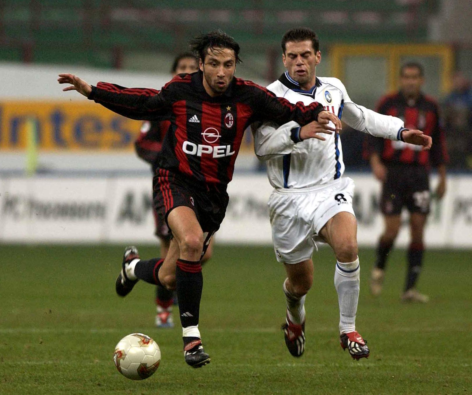 16 Feb 2002: Jose Mari of AC Milan and Luciano Zauri of Atalanta during the Serie A match between AC Milan and Atalanta, played at the San Siro Stadium, Milan. DIGITAL IMAGE Mandatory Credit: Grazia Neri/Getty Images