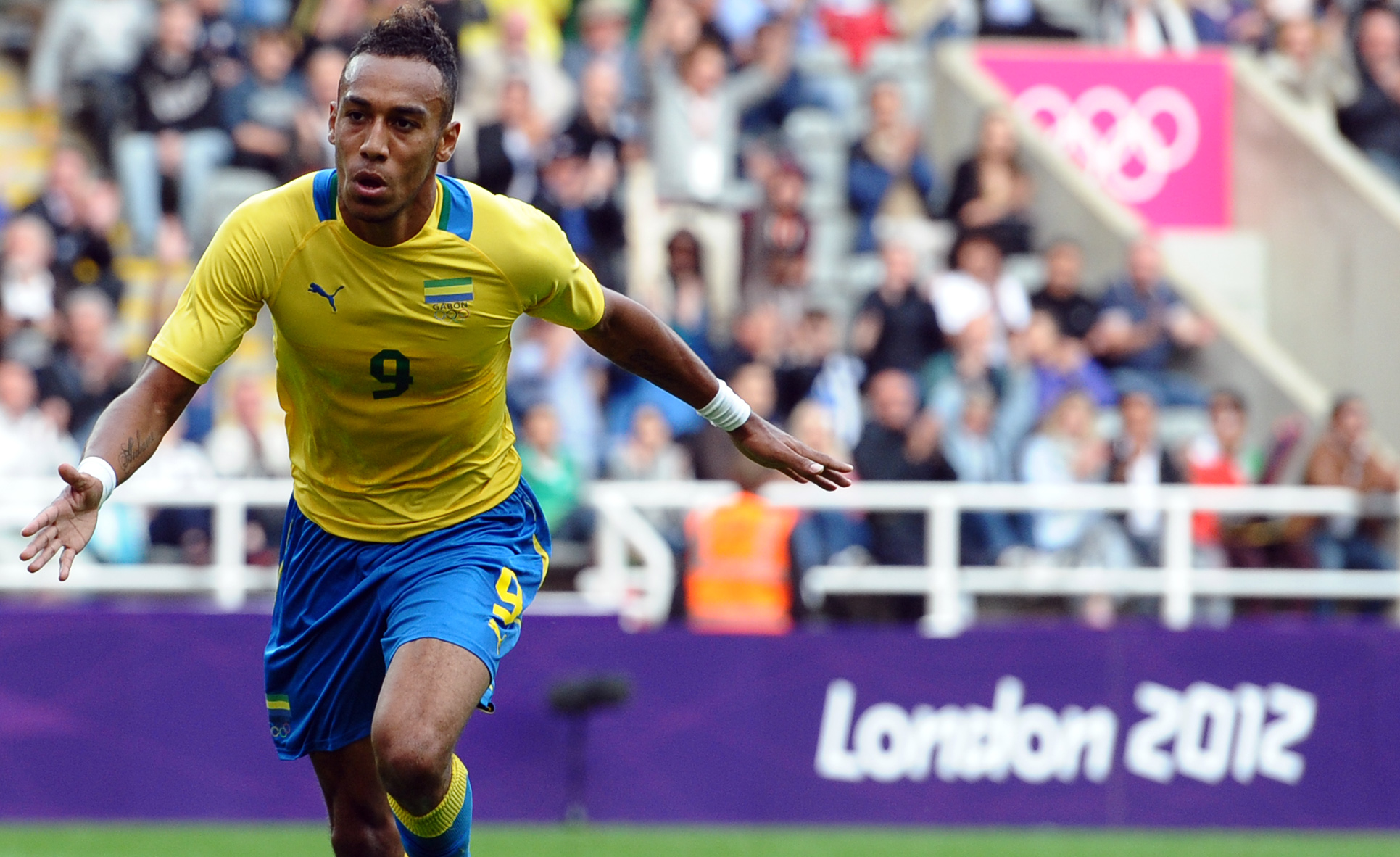 Gabon's Pierre Aubameyang celebrates after scoring during the 2012 Olympic mens football match between Gabon and Switzerland at St James' Park in Newcastle-upon-Tyne, north-east England on July 26, 2012. AFP PHOTO/PAUL ELLIS (Photo credit should read PAUL ELLIS/AFP/GettyImages)