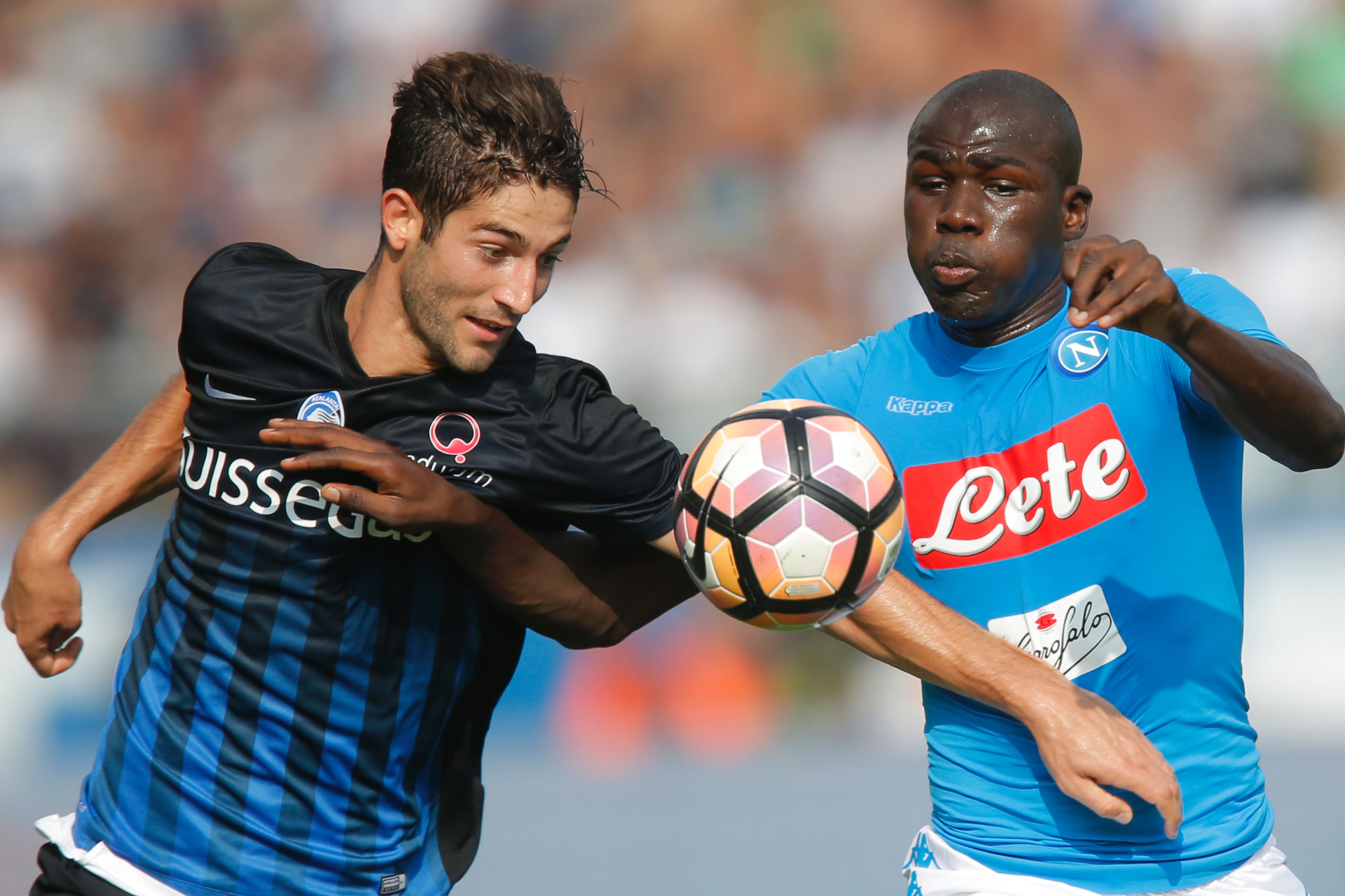 Napoli's defender from France Kalidou Koulibaly (R) vies with Atalanta's midfielder Roberto Gagliardini during the Italian Serie A football match Atalanta vs Napoli on October 2, 2016 in Bergamo. / AFP / Marco BERTORELLO (Photo credit should read MARCO BERTORELLO/AFP/Getty Images)