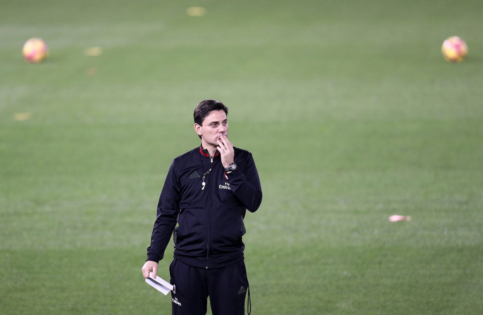 AC Milan's Italian head coach Vincenzo Montella monitors a training session in the Qatari capital Doha on December 22, 2016, on the eve of the Final of the Italian Super Cup between AC Milan and Juventus. / AFP / KARIM JAAFAR (Photo credit should read KARIM JAAFAR/AFP/Getty Images)