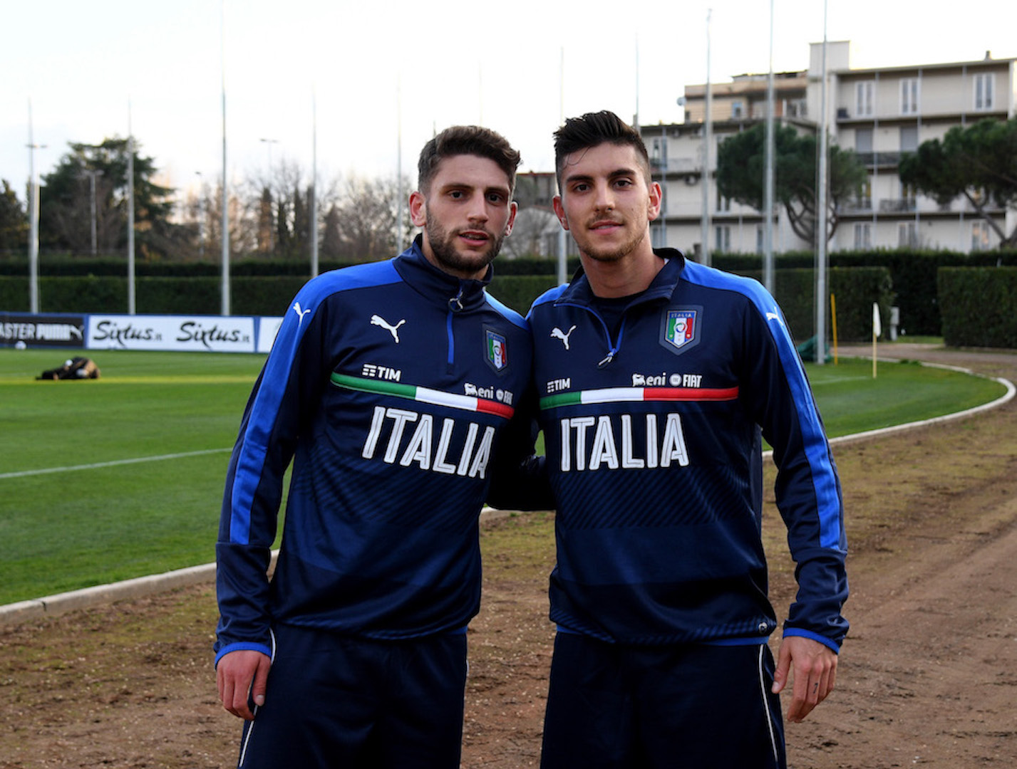 FLORENCE, ITALY - FEBRUARY 21: Domenico Berardi (L) and Lorenzo Pellegrini of Italy pose for a photo prior to the official portrait session at Coverciano on February 21, 2017 in Florence, Italy. (Photo by Claudio Villa/Getty Images)