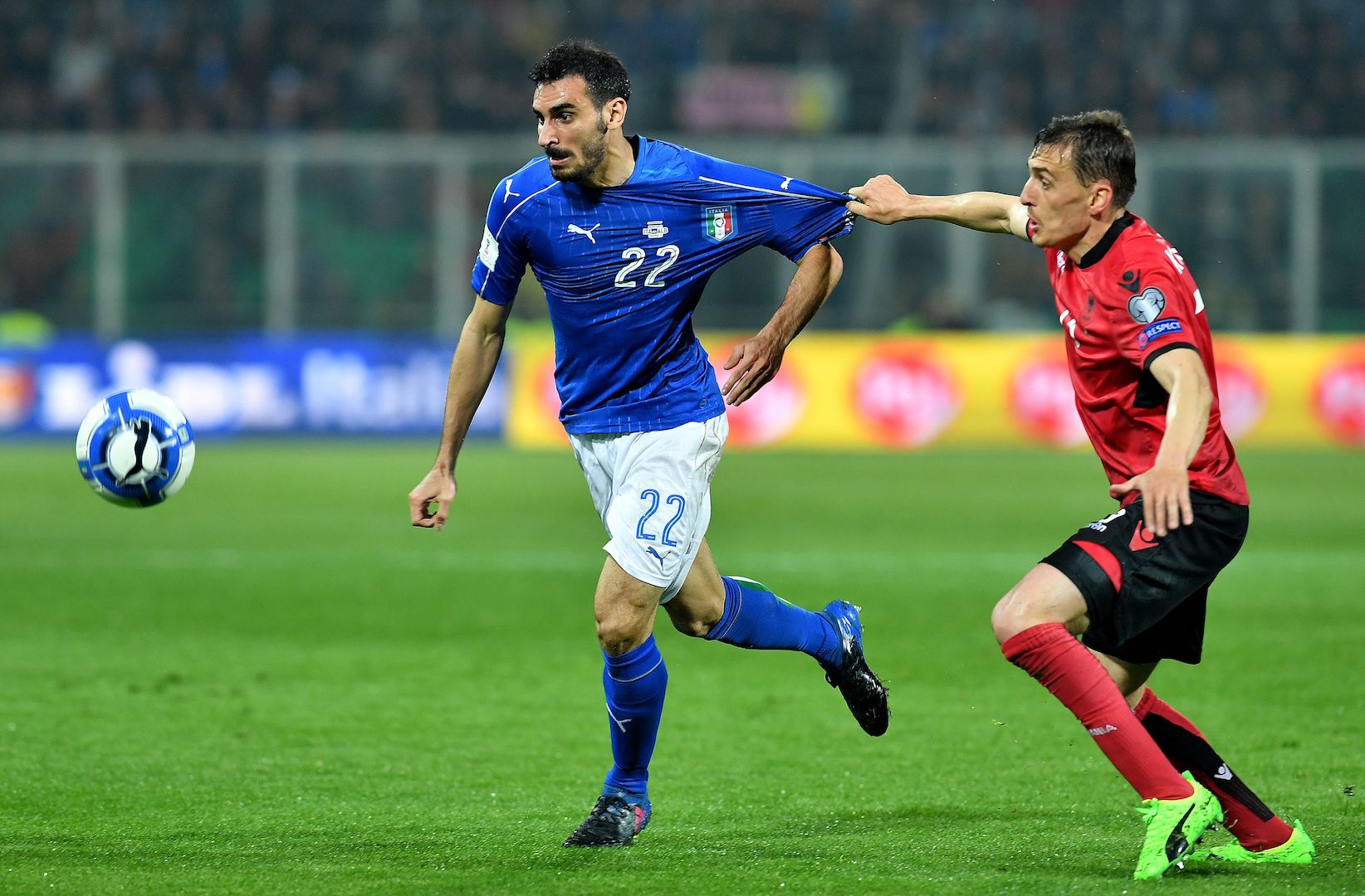 Italy's defender Davide Zappacosta (R) fights for the ball with Albania's midfielder Burim Kukeli during the World Cup 2018 group G qualification football match Italy vs Albania on March 24, 2017 at Renzo Barbera stadium in Palermo. / AFP PHOTO / ALBERTO PIZZOLI (Photo credit should read ALBERTO PIZZOLI/AFP/Getty Images)