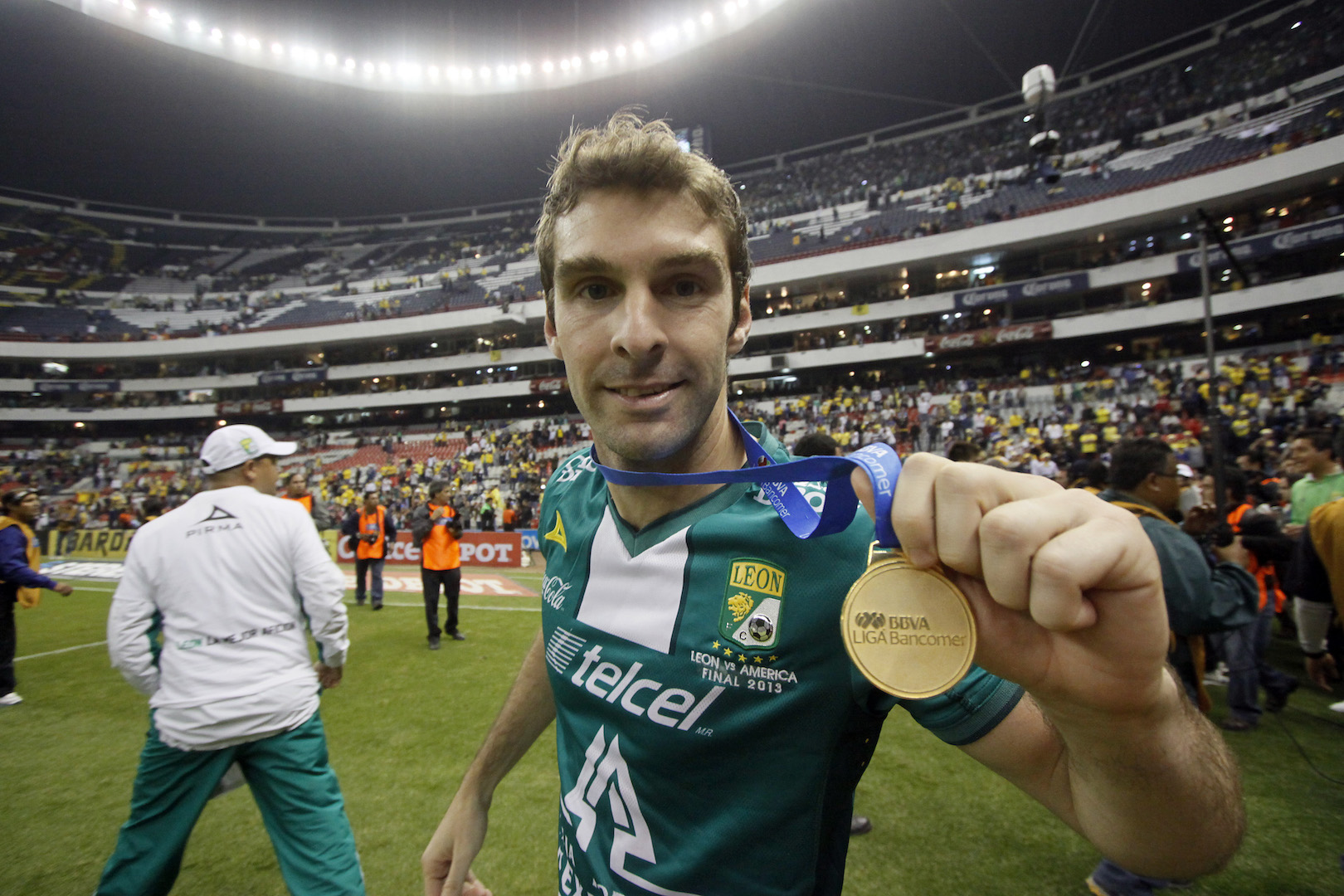 Mauro Boselli of Leon celebrates at the Azteca stadium after Leon defeated America in the final of the Mexican Apertura tournament in Mexico City on December 15, 2013. AFP PHOTO/Hector Guerrero (Photo credit should read HECTOR GUERRERO/AFP/Getty Images)