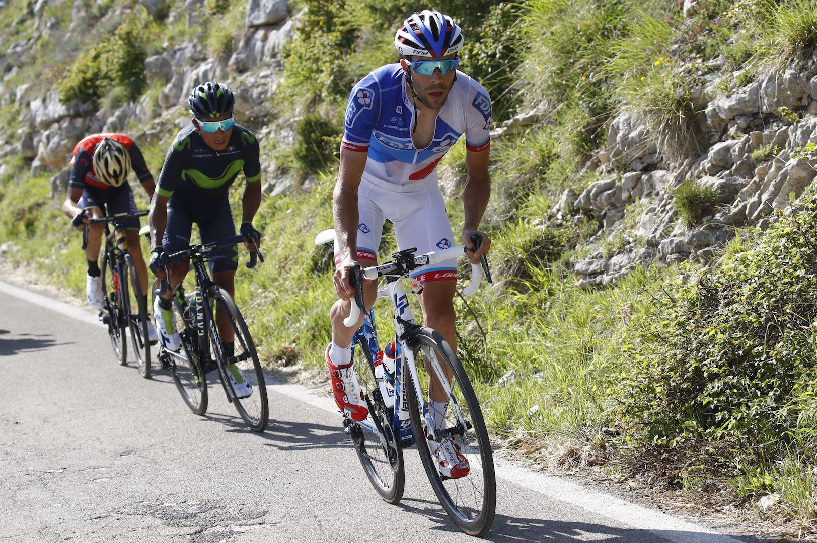 Colombia's Nairo Quintana (C) of team Movistar climbs the Blockhaus with France's Thibaut Pinot (R) of team FDJ and Italy's rider of team Bahrain - Merida Vincenzo Nibali the 9th stage of the 100th Giro d'Italia, Tour of Italy, cycling race from Montenero di Bisaccia to Blockhaus on May 14, 2017. Colombia's Nairo Quintana soared to victory on a dramatic ninth stage of the Giro d'Italia on Sunday to claim the race leader's pink jersey. Movistar's Quintana came over the finish line 23secs ahead of Frenchman Thibaut Pinot and Dutchman Tom Dumoulin, to wrest the race lead from Luxembourg's Bob Jungels. / AFP PHOTO / POOL / LUCA BETTINI (Photo credit should read LUCA BETTINI/AFP/Getty Images)