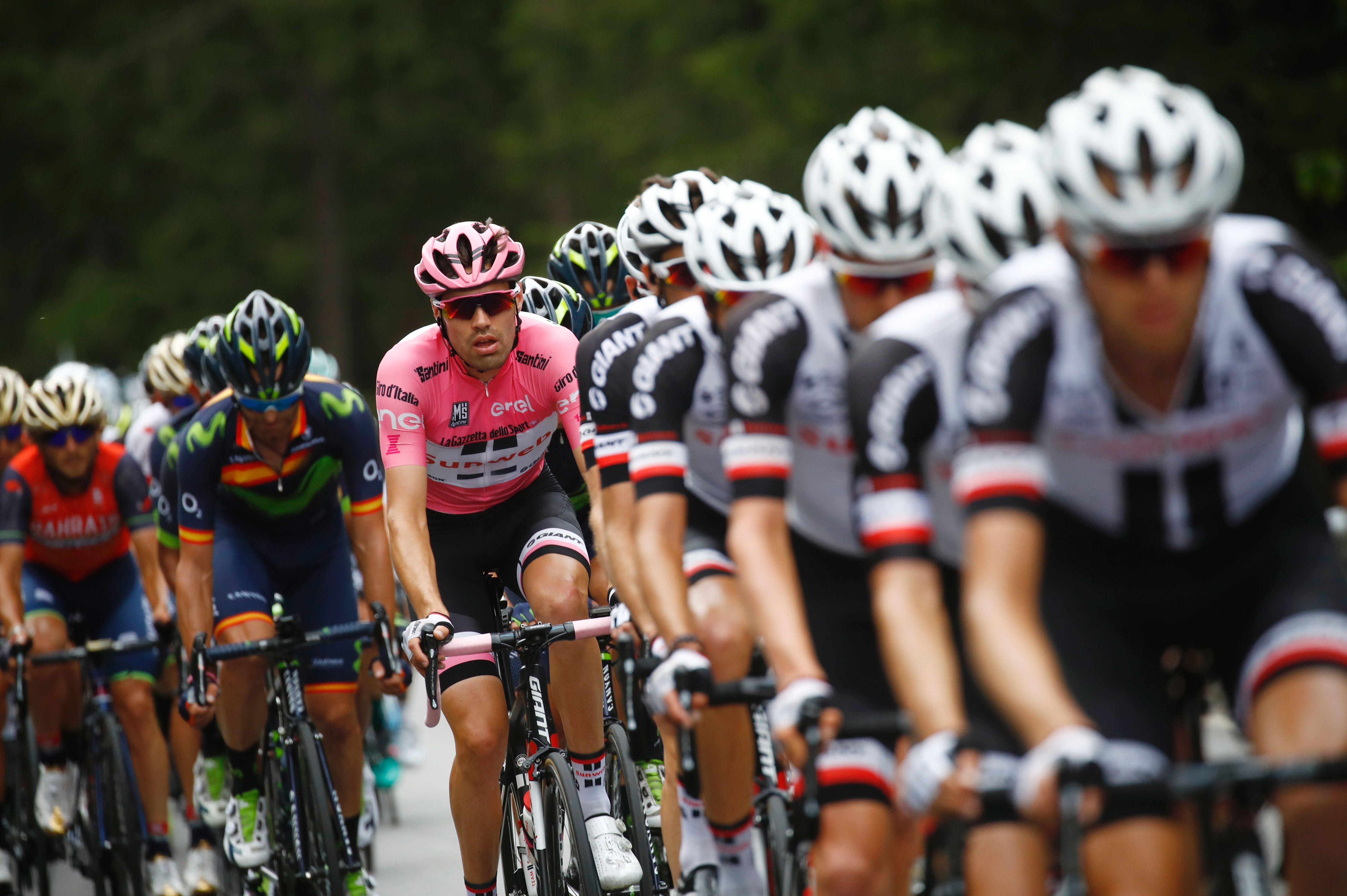 Pink Jersey Tom Dumoulin from Netherlands rides in the peloton during the 17th stage of the 100th Giro d'Italia, Tour of Italy, cycling race from Tirano to Canazei on May 24, 2017. / AFP PHOTO / Luk BENIES (Photo credit should read LUK BENIES/AFP/Getty Images)