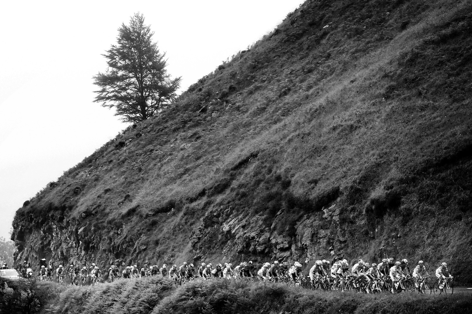 The pack rides in Col du Tourmalet pass during the 174 km and 17th stage of the 2010 Tour de France cycling rece run between Pau and the famous Col du Tourmalet pass in French Pyrenees on July 22, 2010. AFP PHOTO / JOEL SAGET (Photo credit should read JOEL SAGET/AFP/Getty Images)