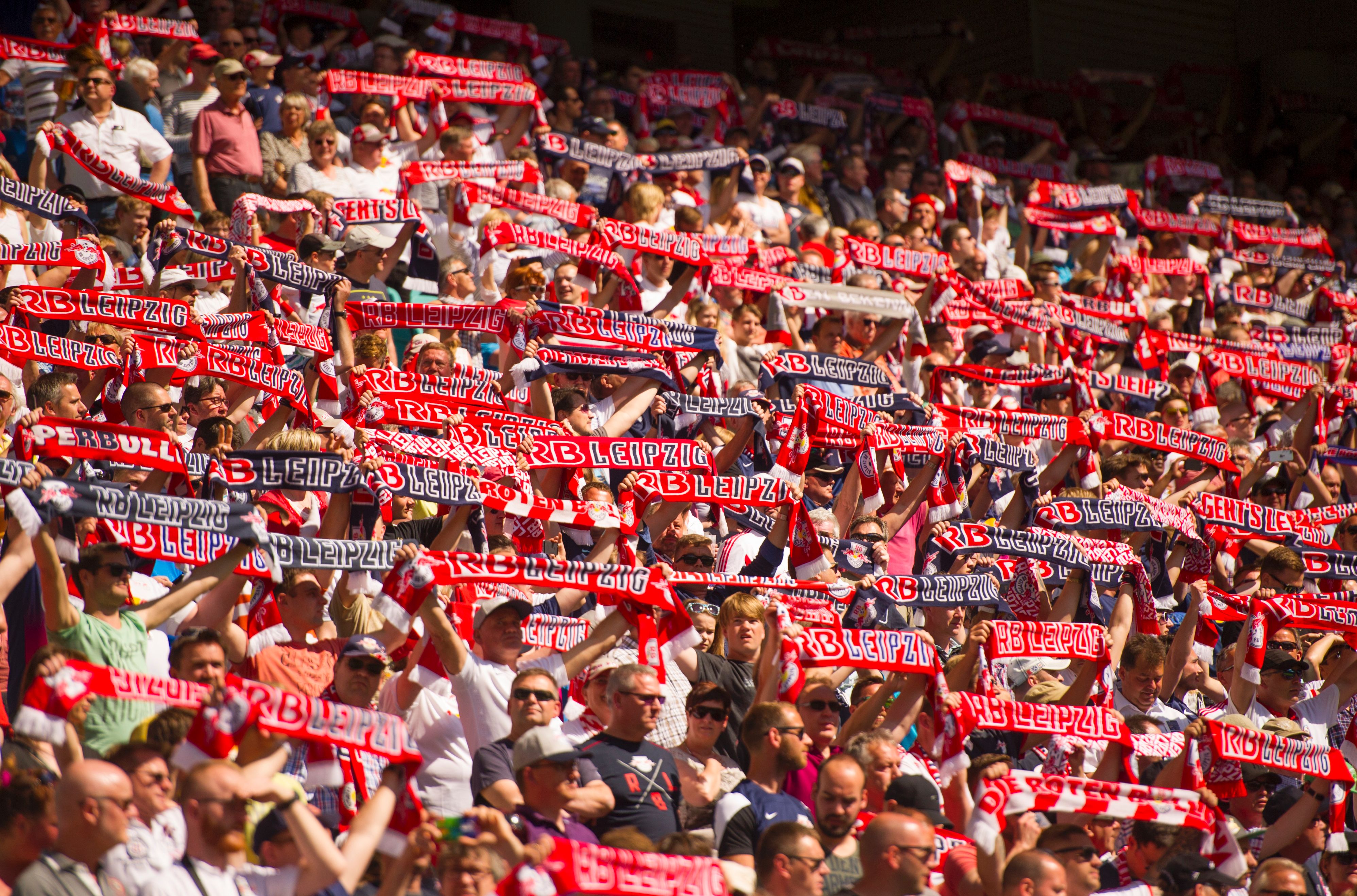 Leipzig's fans cheer duringthe German second division Bundesliga football match between RB Leipzig and Karlsruher SC at the Red Bull Arena in Leipzig, eastern Germany, on May 8, 2016. Leipzig won the match 2-0 and will be promoted to the first division Bundesliga next season. / AFP / Robert MICHAEL (Photo credit should read ROBERT MICHAEL/AFP/Getty Images)