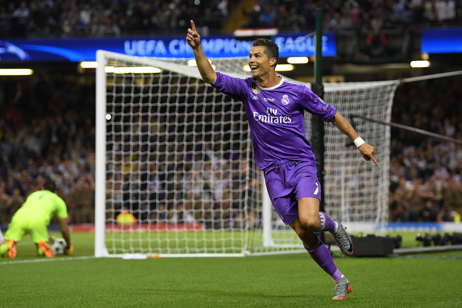 CARDIFF, WALES - JUNE 03: Cristiano Ronaldo of Real Madrid celebrates scoring his sides third goal during the UEFA Champions League Final between Juventus and Real Madrid at National Stadium of Wales on June 3, 2017 in Cardiff, Wales. (Photo by Matthias Hangst/Getty Images)