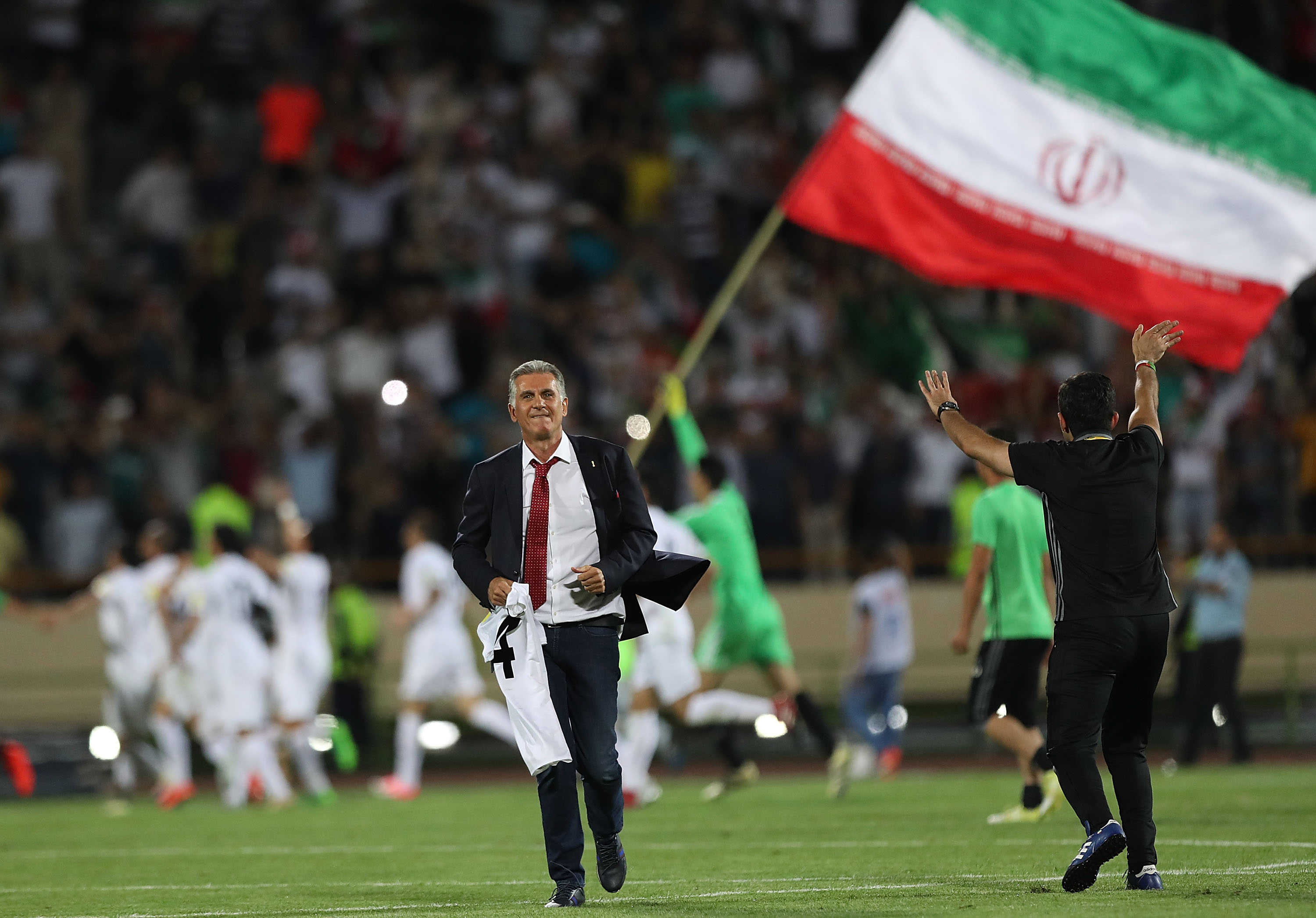 TEHRAN, IRAN - JUNE 12: Head coach Carols Quieroz and players of Iran celebrate after the match during FIFA 2018 World Cup Qualifier match between Iran and Uzbekistan at Azadi Stadium on June 12, 2017 in Tehran, Iran. (Photo by Amin M. Jamali/Getty Images)