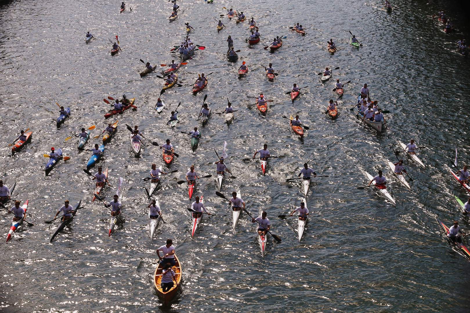 Paris Mayor Anne Hidalgo (bottom) and the co-president of the Paris bid for the 2024 Olympics Tony Estanguet (2ndL) sail on the Seine river in Paris on June 23, 2017, in a bid to promote the candidacy of the city of Paris for the Summer Olympics Games in 2024. / AFP PHOTO / GEOFFROY VAN DER HASSELT (Photo credit should read GEOFFROY VAN DER HASSELT/AFP/Getty Images)