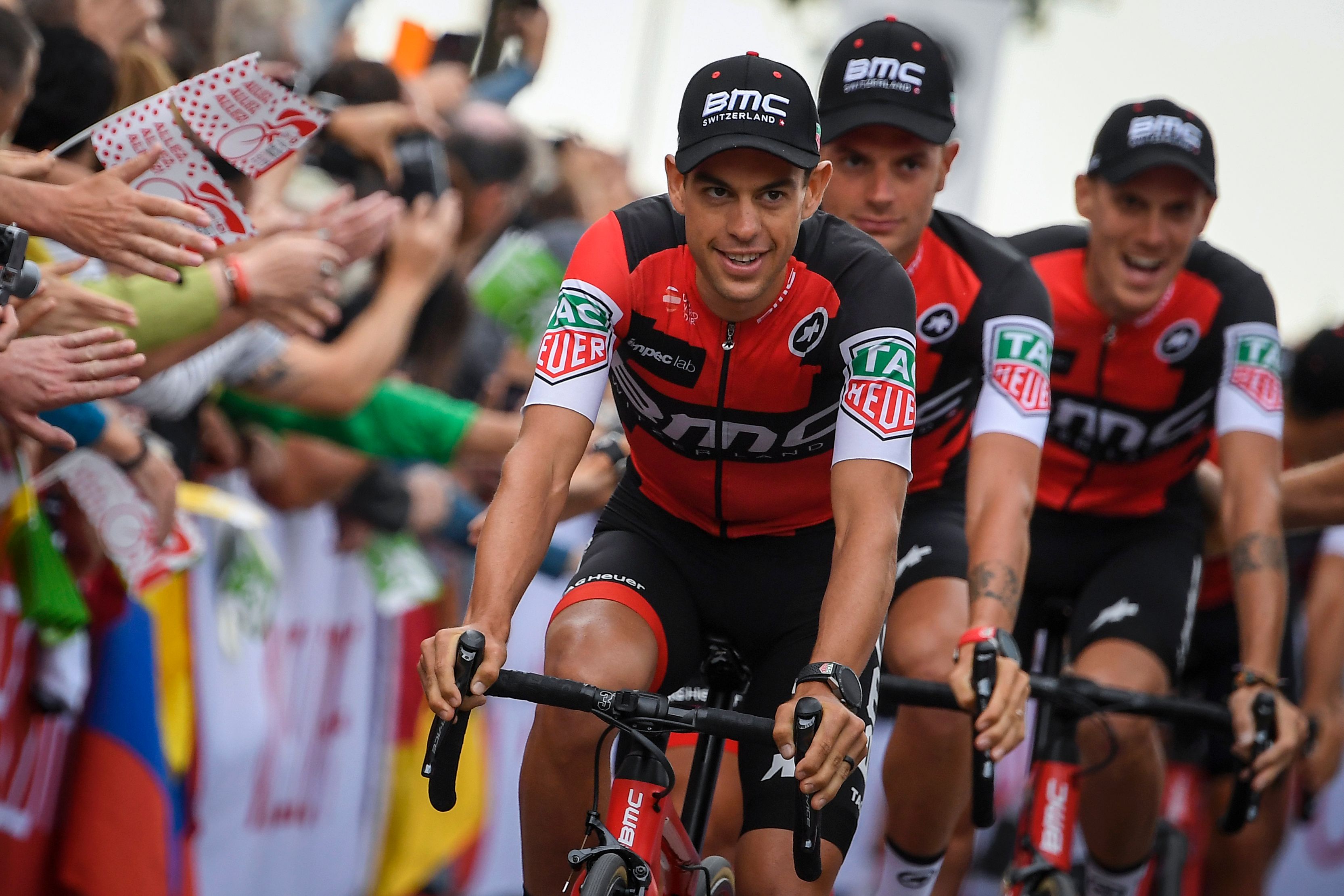 Australia's Richie Porte (L) and his teammates parade during the team presentation ceremony in Dusseldorf, Germany, on June 29, 2017, two days before the start of the 104th edition of the Tour de France cycling race. The 2017 Tour de France will start on July 1 in the streets of Dusseldorf and ends on July 23, 2017 down the Champs-Elysees in Paris. / AFP PHOTO / Lionel BONAVENTURE (Photo credit should read LIONEL BONAVENTURE/AFP/Getty Images)