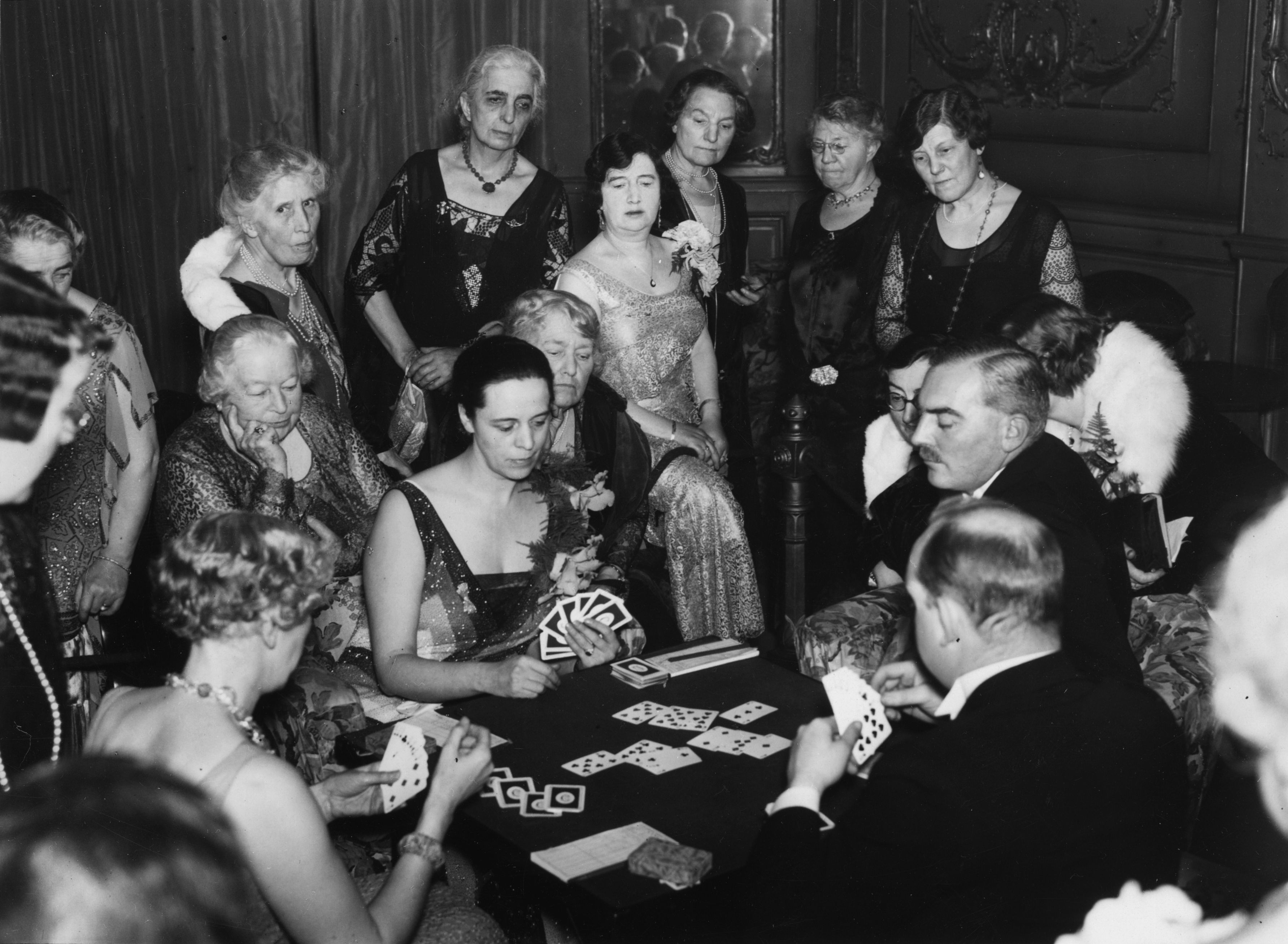 29th November 1930: Four players of the Bridge Club of the Lyceum Club staging the first exhibition of contract bridge held in London in the Lyceum Club's drawing room on Piccadilly, London. (Photo by Sasha/Getty Images)