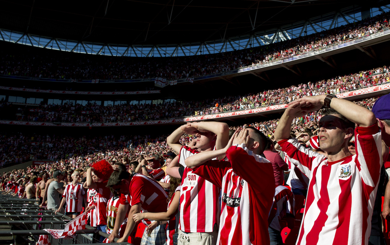 Sheffield United fans react as one of th