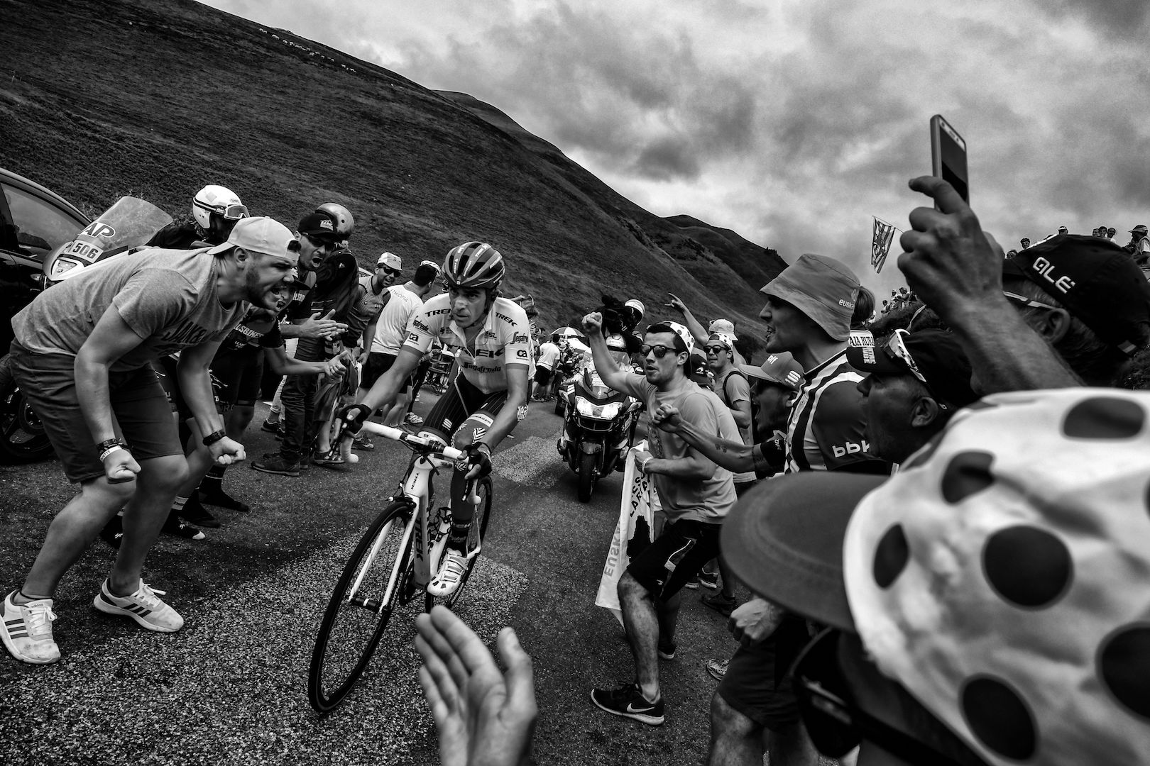 BLACK AND WHITE VERSION Spain's Alberto Contador rides in a breakaway as supporters cheer during the 214,5 km twelfth stage of the 104th edition of the Tour de France cycling race on July 13, 2017 between Pau and Peyragudes. / AFP PHOTO / JEFF PACHOUD (Photo credit should read JEFF PACHOUD/AFP/Getty Images)