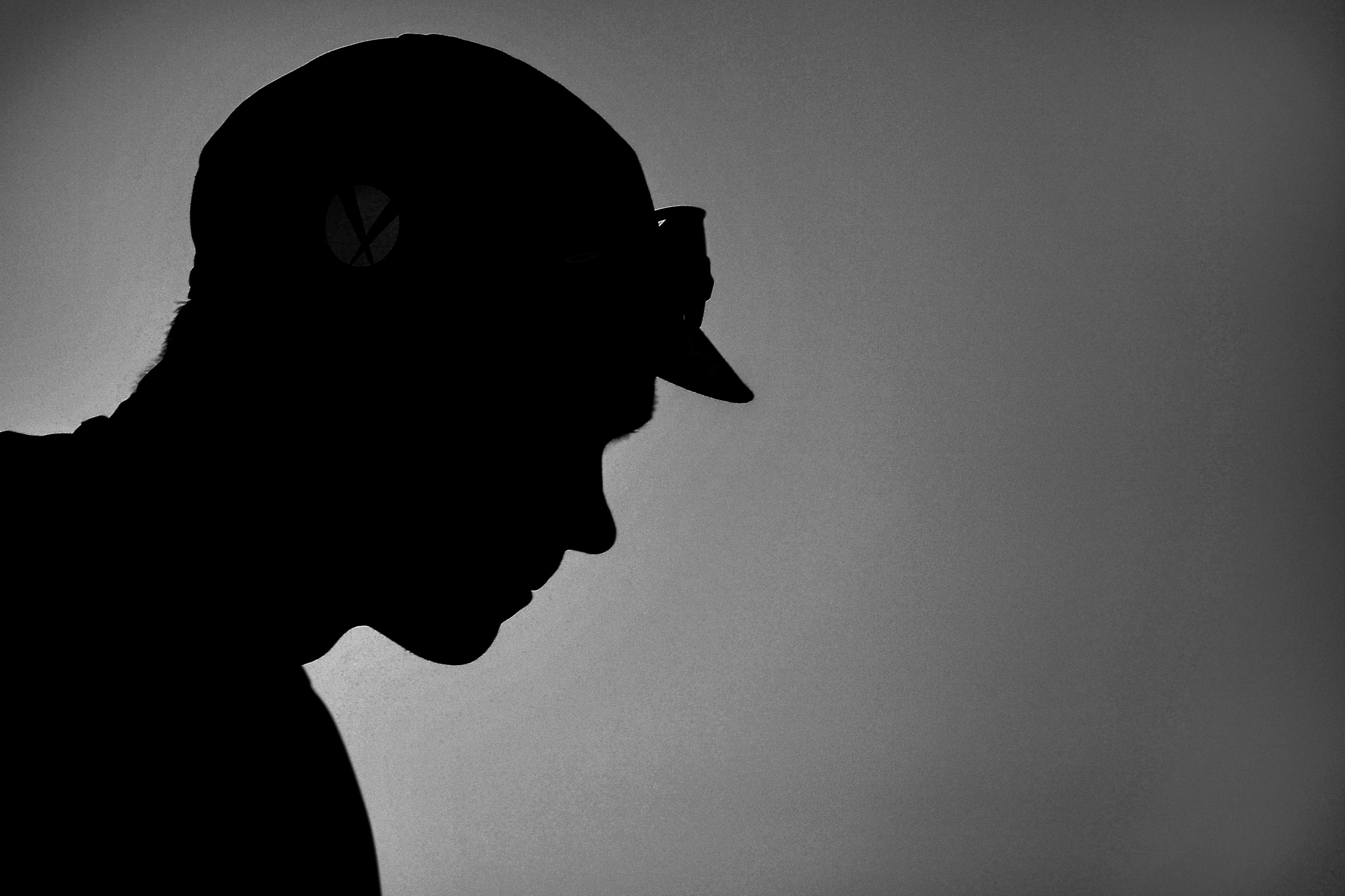 BLACK AND WHITE VERSION Great Britain's Christopher Froome attends the signature ceremony prior to the 189,5 km fifteenth stage of the 104th edition of the Tour de France cycling race on July 16, 2017 between Laissac-Severac l'Eglise and Le Puy-en-Velay. / AFP PHOTO / LIONEL BONAVENTURE (Photo credit should read LIONEL BONAVENTURE/AFP/Getty Images)