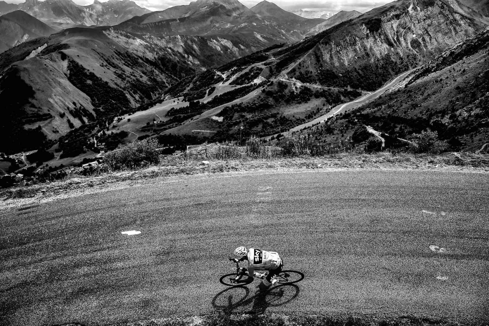 BLACK AND WHITE VERSION Great Britain's Christopher Froome, wearing the overall leader's yellow jersey, rides during the 183 km seventeenth stage of the 104th edition of the Tour de France cycling race on July 19, 2017 between Le La Mure and Serre-Chevalier, French Alps. / AFP PHOTO / LIONEL BONAVENTURE (Photo credit should read LIONEL BONAVENTURE/AFP/Getty Images)