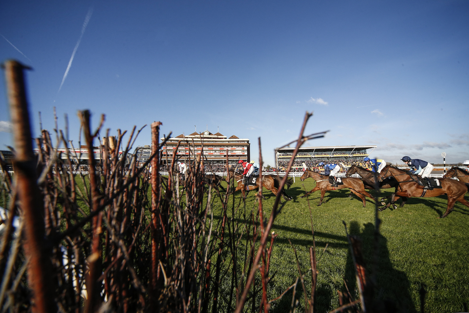 NEWBURY, ENGLAND - DECEMBER 01: A general view as runners pass the grandstands at Newbury racecourse on December 1, 2017 in Newbury, United Kingdom. (Photo by Alan Crowhurst/Getty Images)